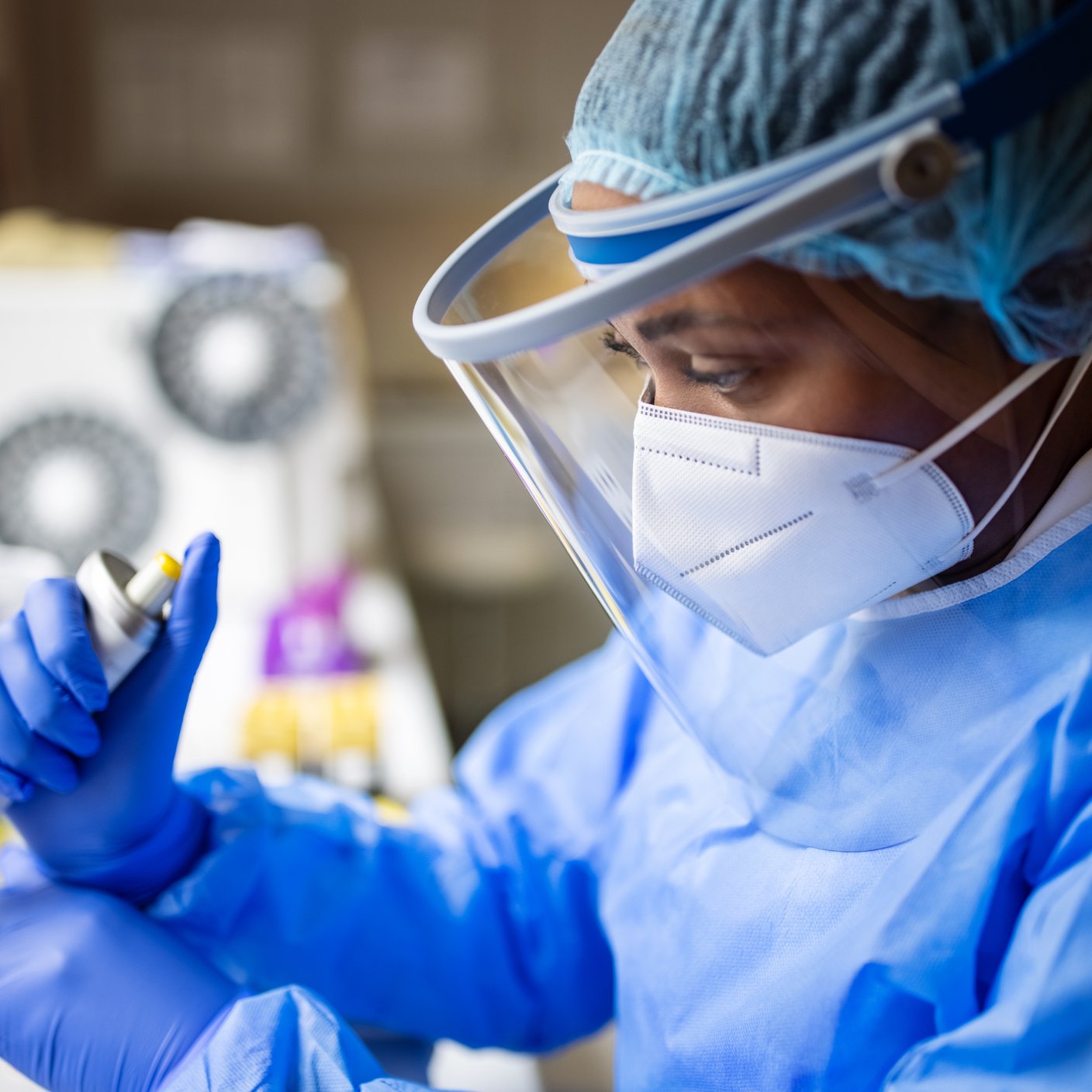 Researcher working in a biochemist laboratory.
