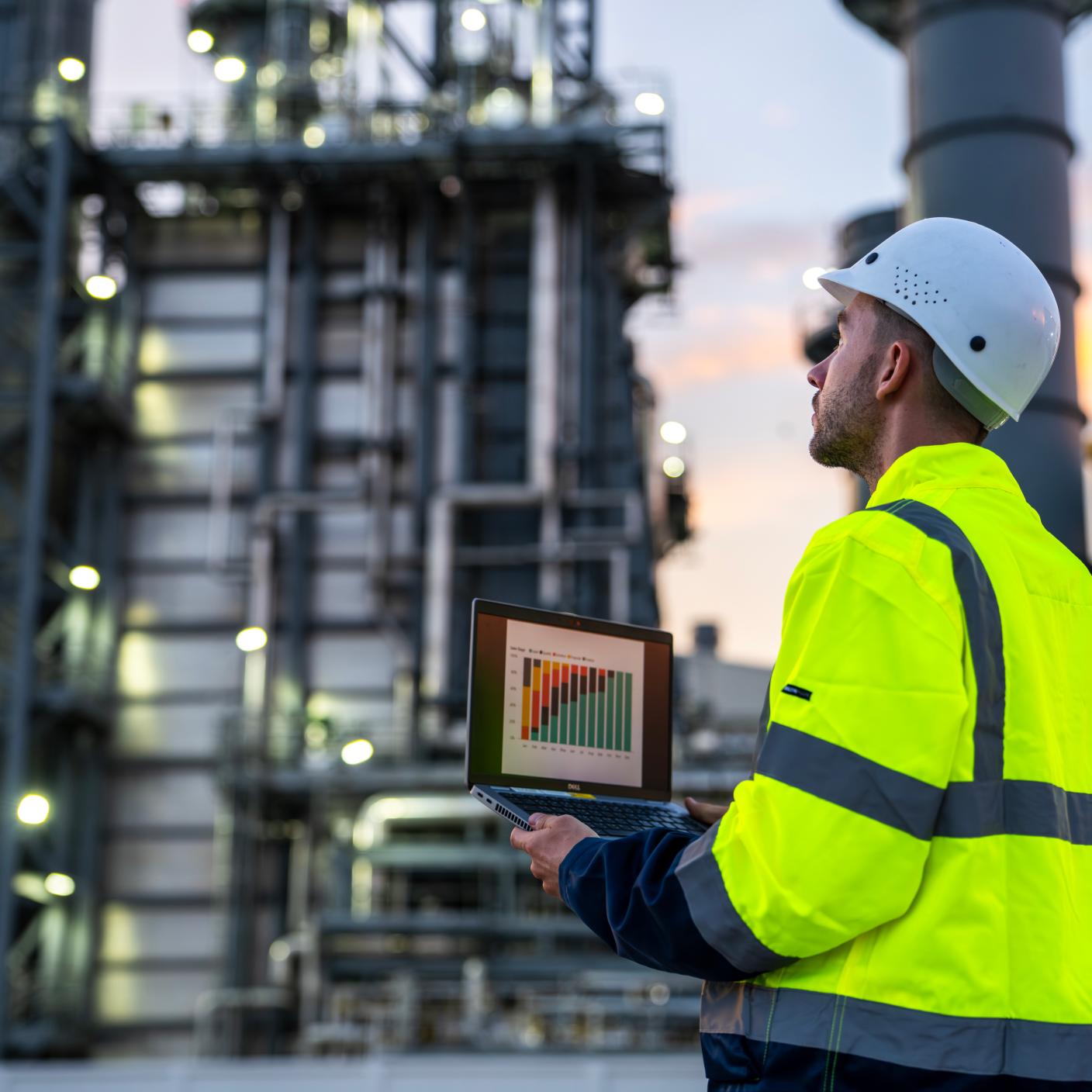 Industrial Engineer Monitoring Facility with Technology